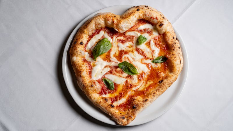 Chuys stone-fired thin-crust pizza fresh from the oven
